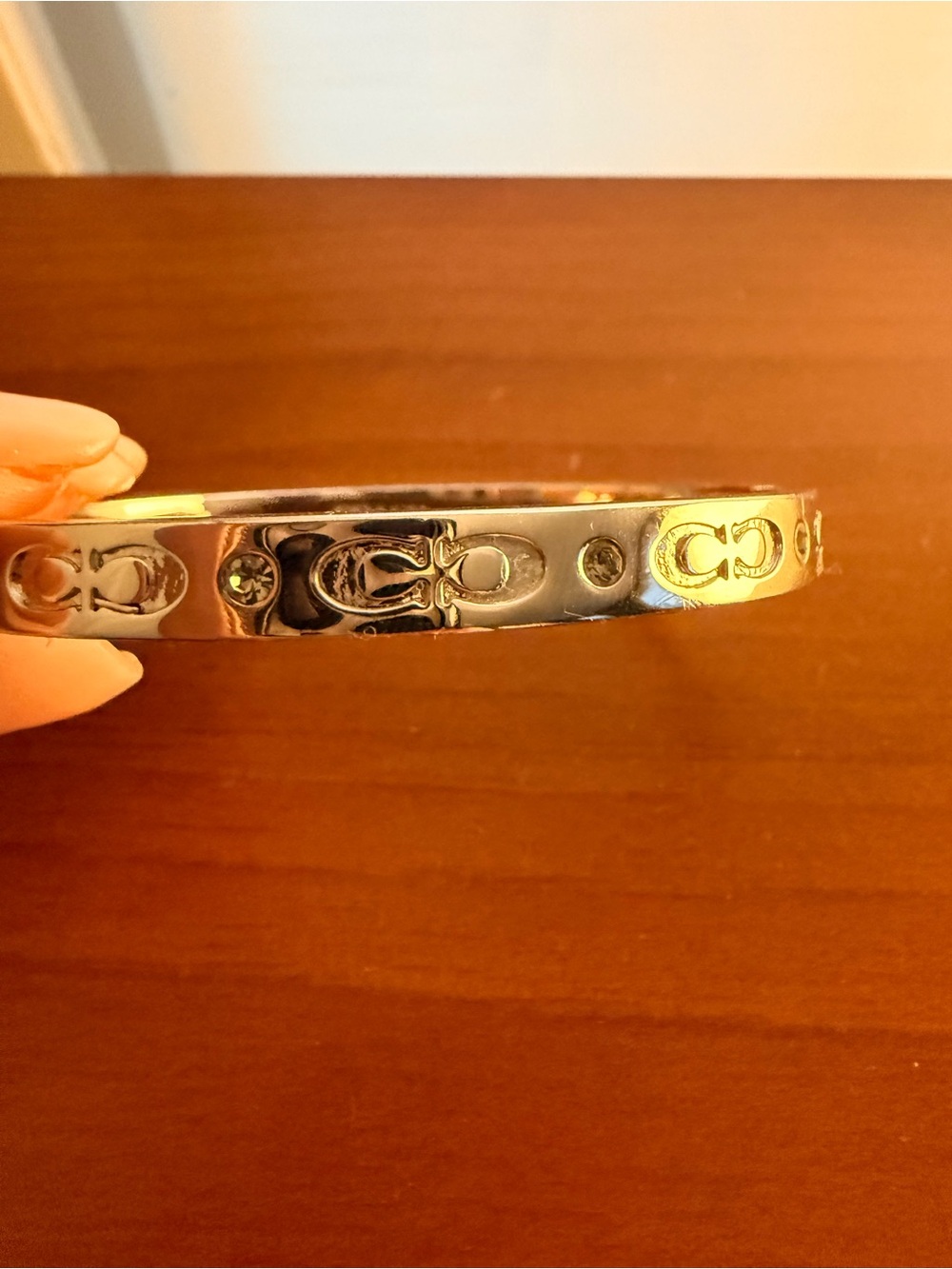 Coach Silver-Tone Logo Bangle with Crystal Accents - Picture 2 of 5
